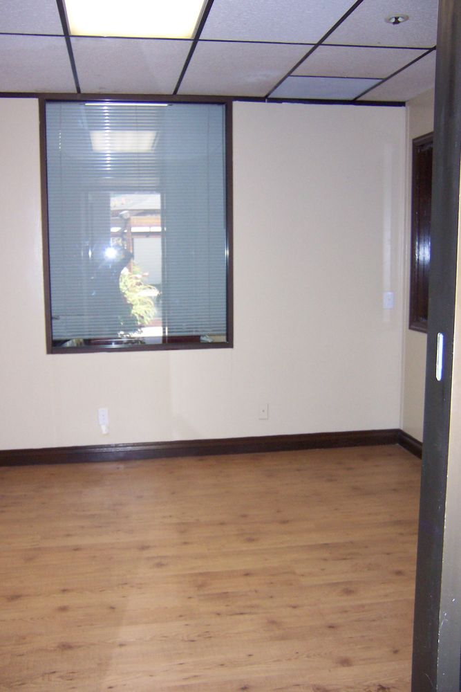 PRIVATE OFFICE WITH GLASS DOOR TO GAZEBO. Ground floor.